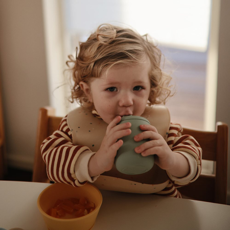 Mushie® Tazza con cannuccia in silicone Ivory